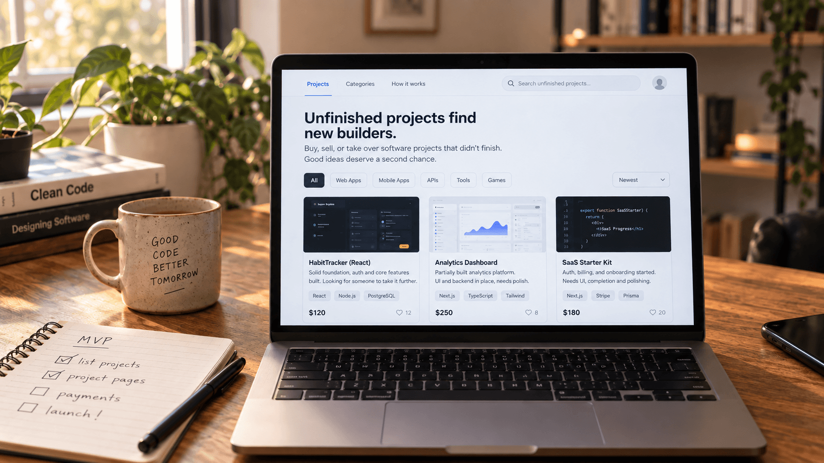 A laptop showing an unfinished-project marketplace beside an MVP checklist, representing the first project I tried to build.